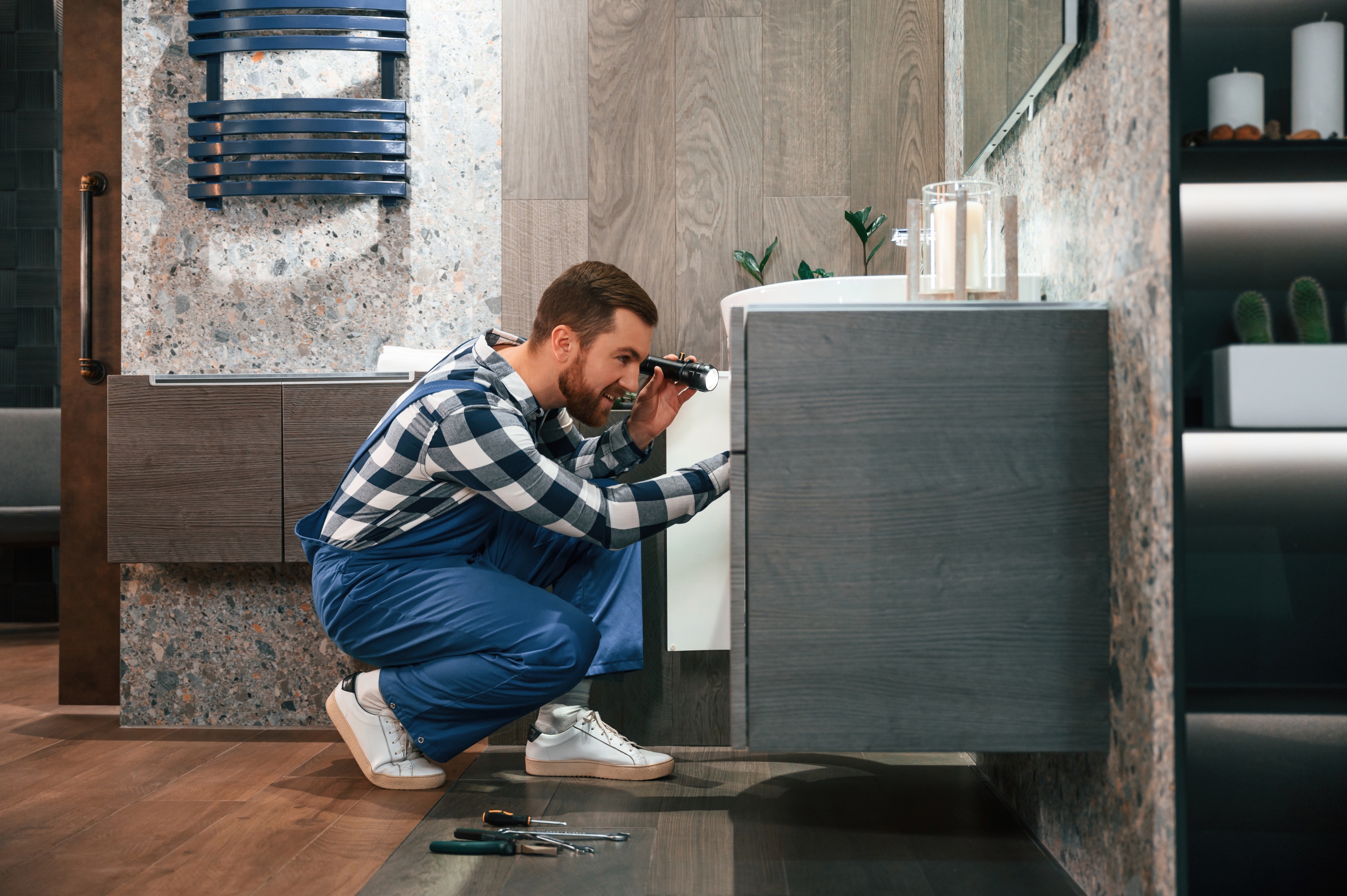 Professional plumber at work